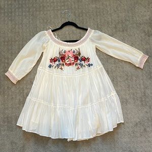 White dress with embroidery detail